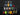 Collection of various Shropshire ale bottles on a dark surface with a black background