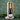 Bottle of Tanners champagne in a wooden box with a green leafy background