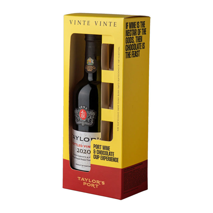 Taylor's Port wine bottle in a yellow and red gift box on a white background.